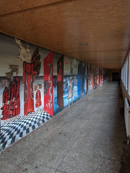 The Baltics Tour 2019 Corridor Mural in Abandoned Lithuanian Sanatorium