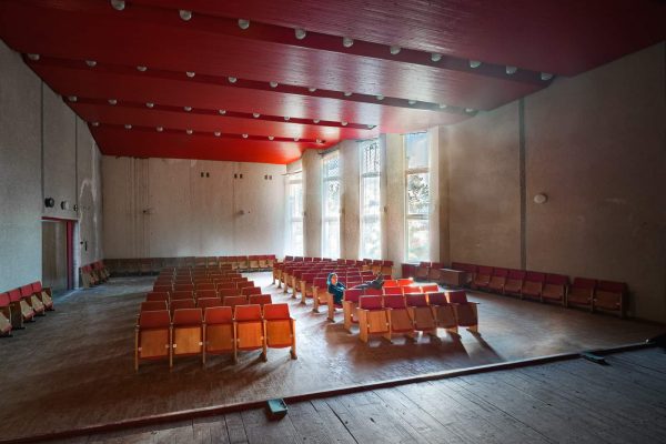 The Baltics Tour 2019 Janine Pendleton Selfie in Abandoned Music School Theatre