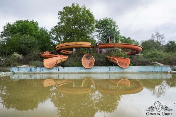 Unfinished Water Park Portugal Orange Triple Slide Reflections